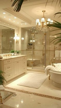 a large bathroom with a tub, sink and shower