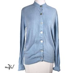 "Vintage 50s Baby Blue Cardigan Sweater w Grosgrain Ribbon - Sz XL - Hey Viv !  * Special Feature: Button up baby blue cardigan.  * Material: probably acrylic  * Closure: button front with blue grosgrain ribbon inside on each side under the buttons  * Tag: no tag  * Measurements: Bust: 40\", Waist: 38\", Sleeves: 26\", Length Back Neckline to Hem: 26\" Condition: This item is in overall very good condition.  EP-22-1219-02 Thanks for stopping by :) and shopping at a Small US Based Business Please Affordable Blue Button-up Cardigan, Cheap Blue Button-up Sweater, Button Up Cardigan, Blue Cardigan, Blue Long Sleeve, Vintage Sweaters, Cardigans For Women, Cardigan Sweater, Baby Blue