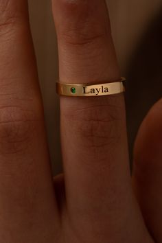 Name in your ring, here is our new personlized custom name ring with birthstone.  Size options, we are using US Ring Size option for EU or other country chart please write us.  ✨How can you place an order? ⭐Please write the names in the personalization section according to the chart we provided fonts and stones. ⭐We can engrave your names. If you only want to write a name, please write it in the personalization section, and it is case sensitive. Additionally, you can choose a special font for the name from the font chart. For example: Amy Font 2 (May). Birth Stone Options: 🔹January Birthstone  : Garnet 🔹February Birthstone : Amethyst 🔹March Birthstone  : Aquamarine 🔹April Birthstone : Diamond 🔹May Birthstone  : Emerald 🔹June Birthstone : Yellow Alexandrite 🔹July Birthstone  : Ruby ? Personalized Nameplate Ring For Promise, Personalized Engraved Nameplate Ring For Promise, Customizable Nameplate Jewelry For Promise, Personalized Nameplate Promise Ring, Customizable Nameplate Promise Ring, Engraved Nameplate Ring For Promise, Nameplate Engraved Ring For Gift, Promise Ring With Nameplate Engraved, Personalized 14k Gold Birthstone Ring For Anniversary