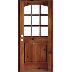 a wooden door with glass panels on the top and bottom panel, in front of a white background