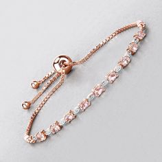 Morganite Bracelet, Natural Morganite Bolo Bracelet in .925 Sterling Silver with 18 Karat Rose Gold Plating, Bridesmaid Gift, Gift For Her This 1.38 carat genuine morganite and white diamond bolo bracelet is a stunning blend of timeless beauty and modern design. The .925 sterling silver setting showcases a beautiful morganite gemstone with a soft, pinkish-peach tone, surrounded by brilliant white diamonds that add a touch of sparkle. The adjustable bolo closure provides a customized fit, ensurin Rose Gold Gemstone Bracelet, Rose Gold Gemstone Bracelet In Fine Jewelry Style, Elegant Pink Sterling Silver Bracelets, Elegant Pink Sterling Silver Bracelet, Elegant Rose Gold Bracelets With Gemstones, Sterling Silver Rose Gold Bracelets For Wedding, Rose Gold Sterling Silver Bracelets For Wedding, Elegant Adjustable Pink Sterling Silver Bracelet, Formal Rose Gold Sterling Silver Bracelet