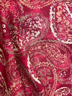 a red and white paisley print fabric