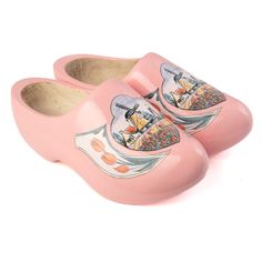 a pair of pink clogs with pictures on the front and back of them