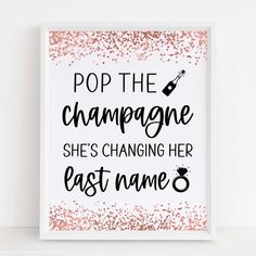 a pink and black print with the words pop the champagne she's changing her east name