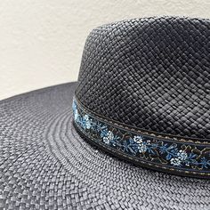 An elegant and highly versatile fashion statement, the Zoé straw fedora is designed with a teardrop crown and a large upturned brim, perfect for sun protection. Its versatility allows you to adjust the brim to your taste; up and curled up or down! It also features an adjustable sweatband to suit a variety of head sizes. Tall crown: 10cm | 3.94" Large brim: 12 cm | 4.72" Color: black UPF 50+ Handwoven in Ecuador Adjustable inner sweat band for added custom fit Pencil Curls, Tall Crown, Straw Fedora Hat, Sweat Band, Straw Fedora, Floral Ribbon, Vintage Silhouette, Fedora Hat, Wide Brimmed