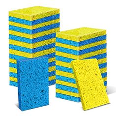 several different colored sponges stacked on top of each other