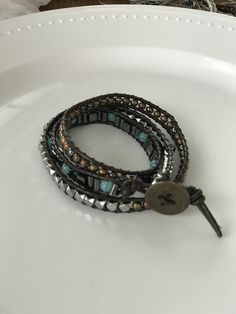 Hand made bracelets, triple wrap.  Made with leather cord, beads.  It takes about 2 hours to make a triple wrap.  Just started making them for a hobby. Adjustable Hand Wrapped Leather Wrap Bracelet, Made Bracelets, It Takes, Leather Cord, Jewelry Bracelets, Hand Made, Handmade Items, Beaded Bracelets, Take That