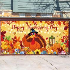 a large happy thanksgiving sign with a turkey on it