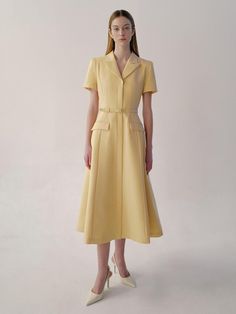 This is BAU by Bride And You’s mini dress, beloved for its classic design, features luxurious textured fabric and jacket-style details on the top, emphasizing a classic mood. The flared skirt adds to its femininity. The V-neck notched collar creates a slender neckline, while the spacious shoulder line covers the arms. Inside the skirt, there's a full lining that accentuates the skirt line, creating a more dimensional silhouette and structural body line.- Perfect for both daily wear and special occasions- Can be styled with various accessories to create different looks- Features a zipper at the back for easy wearing and removal- Pairing it with the optional belt provided will enhance the overall look Luxury Fitted A-line Midi Dress, Chic A-line Midi Dress With Structured Boning, Luxury Short Sleeve Midi Dress For Work, Classic Dresses With Structured Boning And Fitted Bodice, Tailored A-line Dress For Semi-formal Occasions, Semi-formal Dresses With Structured Boning, Semi-formal Fitted Dress With Structured Boning, Classic Tailored A-line Dress, A-line Mini Dress With Structured Boning For Work