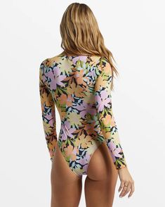 Styled with a V-neck, functional front tie, and a keyhole cutout, the Mas Aloha Long Sleeve Swimsuit stands out from the rest of the lineup. This printed swimsuit is made with partially recycled Peach Stretch fabric offering enhanced sun protection because the more time you spend in the water, the more fun you have. Fabric: 85% Recycled polyester 15% elastane blend peach stretch fabric UV Protection: UPF 50+ sun protection Fit: Classic fit Neck: Scoop front neck Sleeves: Long sleeves Coverage: B Long Sleeve Bodysuit For Poolside And Beach Season, Poolside Long Sleeve Bodysuit For Beach Season, Long Sleeve Tropical Print Swimwear For Spring, Long Sleeve Floral Print Swimwear For Beach Season, Multicolor Long Sleeve Swimwear For Poolside, Multicolor Long Sleeve Bodysuit For Beachwear, Printed Long Sleeve Beachwear Swimwear, Printed Long Sleeve Bodysuit For Beachwear, Long Sleeve Tropical Print Beachwear