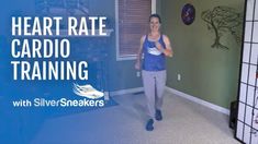 a woman is walking in the middle of a room with words that read heart rate cardio training