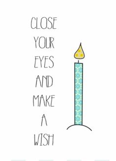 a candle with the words close your eyes and make a wish