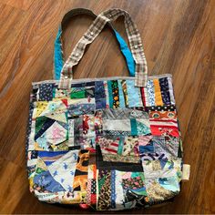 I Created These Totes With Sustainability In Mind. Fabric Scraps Have Been Sewn Together To Form Mini Quilts And Then Sewn Together Into A Larger Design. Back Is Made From Canvas Or Heavy Fabric. Lined On The Inside. Pockets Inside And Out! Measures 17” Wide, 14” Tall, Roughly. 3 1/2” Gusset. Strap Is Approximately 25” Long. Last Four Photos Are For Measurements Only And Might Not Be Your Exact Tote. Tags: Handmade, Quilt, Panic In Polkadots, Sewn, Hand Stitched, Cotton, Display, Ooak, One Of A Multicolor Patchwork Bags For Shopping, Everyday Use Patchwork Satchel Bag, Patchwork Satchel Bag For Everyday Use, Everyday Patchwork Satchel Bag, Everyday Patchwork Tote Shoulder Bag, Blue Rectangular Upcycled Shoulder Bag, Travel Tote Bag With Patchwork, Casual Blue Upcycled Bags, Multicolor Upcycled Tote Shoulder Bag