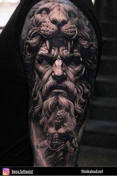 a man's arm with an image of a lion and a bearded man on it