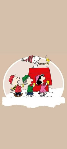 charlie brown and his gang on top of a red house with the cat in the hat