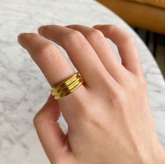 Minimal gold triple band ring. This ring is so chic and timeless. Wear it alone for a statement look or stack together with other stacking rings. ………………………………….D E T A I L S• Materials: Stainless Steel, 18k gold plating.• Available Size: US 6 (Diameter: 16.5mm), US 7 (Diameter: 17.3mm), US8 (Diameter: 18.2mm)• This product is hypoallergenic, water and tarnish resistant Thick Gold Hoop Earrings, Rib Ring, Triple Band Ring, Chunky Gold Hoop Earrings, Minimal Gold, Dainty Gold Rings, Gold Statement Ring, Linking Rings, Gold Ring Stack