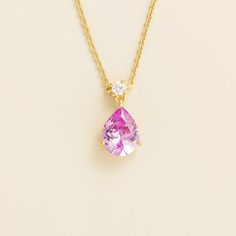 Ori necklace in 18K gold vermeil set with Pink sapphire and Diamond. Mesmerizing simplicity that never goes unnoticed. Pink sapphire: ~1. 75 carats (9mm x 7mm pear) Diamond VS+ grade: ~0. 06 carats Pendant dimensions: 12. 8mm height x 7. 7mm width x 4. 9mm depth Length: adjustable 16-18 inches chain Options available to make the necklace in 9K, 14K and 18K gold, and additional sizes, please contact Juvetti. See matching Ori earrings Our precious jewellery is designed to preserve its original bri Drop Pendant Necklace, Pear Diamond, Diamond Set, Mens Jewelry Bracelet, Precious Jewelry, Drop Pendant, Round Pendant, Gold Set, Precious Gemstones