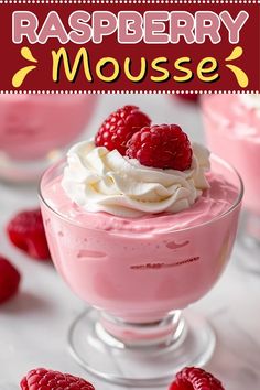 raspberry mousse with whipped cream and fresh raspberries