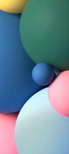 an abstract background with many different colored balloons in the air, including one blue and one pink