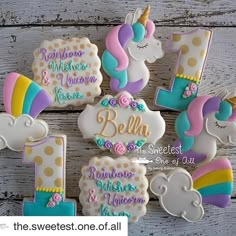 decorated cookies with the number one and unicorns for 1st birthday or baby shower party