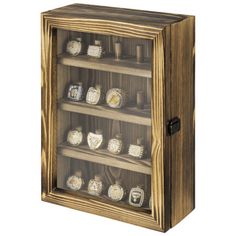 a wooden display case filled with lots of different items