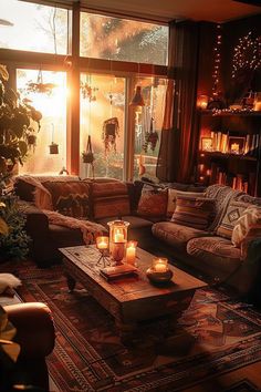 a living room filled with lots of furniture and candles on top of a coffee table