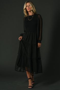 The Remi Ribbed Maxi Dress is trendy and timeless in classic black. Featuring a chic round neckline, sheer puffed sleeves with sweater knit cuffs, and a maxi-length skirt adorned with tiered tulle overlay, this dress is a sophisticated statement piece for any occasion. Fall Staple Pieces, Ribbed Maxi Dress, Perfect Cardigan, Baltic Born, Velvet Maxi Dress, Mob Dresses, Glamorous Dresses, Maxi Dress Black, Short Sleeve Maxi Dresses