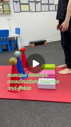 a person standing on top of a yoga mat