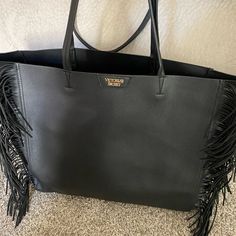 Brand New Condition Black Fringe Bag For Shopping, Chic Victoria's Secret Bags For On-the-go, Black Rectangular Bag With Fringe, Chic Victoria's Secret Shoulder Bag For On-the-go, Victoria's Secret Black Travel Shoulder Bag, Victoria's Secret Black Shoulder Bag For Travel, Victoria's Secret Black Rectangular Bag, Black Rectangular Victoria's Secret Bag, Black Fringe Shoulder Bag For Shopping