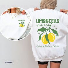 Get ready to be OBSESSED with our new Limoncello Spritz Club - Portofino Italia Crewneck Sweatshirt! It's the cutest and most trendy way to emit all those important Tomato Girl Summer Aesthetic Vibes! This is the perfect Y2K Beachy Hoodie. This is the perfect Amalfi Coast Bridal Shower or Bachelorette Sweatshirt. Also great as bartender gift or a gift for all the Limoncello Spritz Signature Drink Lovers! * Q U I C K * F A C T S * ✺ 100% preshrunk cotton ✺ Wash and dry normally (on cool for best results) * S I Z I N G * ✺ Models are wearing size XL ✺ Sizing is unisex so runs like men's, though not overly large ✺ Most women find their typical size works best, since they are meant to fit a touch loose ✺ Size guide and fit: See the last photo in the slides for size guide and measurements.  * S Tomato Girl Summer, Limoncello Spritz, Summer Crewneck, Tomato Girl, Lemon Shirt, Portofino Italy, Bartender Gifts, Coastal Granddaughter, Aesthetic Vibes