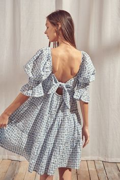 This must-have baby doll mini dress is the perfect combination of beauty and sweetness, embroidered with a gingham floral pattern. It features a square neckline, puffy 3/4 length sleeves with ruffled cuffs, and an open back with a self-tie bow. This gingham dress is sure to be the perfect addition to any picnic, spring and summer or everyday outfit. Material:Cotton Final sale item. Cannot be canceled or returned. Gingham Dress Outfit, Babydoll Dress Outfit, Picnic Spring, Blue White Fabric, Gingham Outfit, Blue Gingham Dress, Picnic Dress, Blue Gingham, Gingham Dress