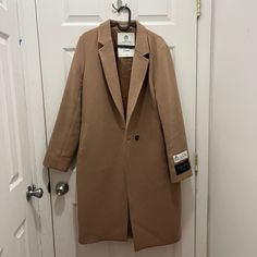 Size M Pretty Much Perfect Condition Aritzia Babaton The Stedman Coat Made In Italy Great For Spring!! I Love This Coat :,) Camel Long Coat With Pockets, Camel Lapel Collar Outerwear For Work, Camel Long Coat For Workwear, Camel Long Coat For Work, Camel Long Sleeve Business Outerwear, Camel Business Outerwear, Camel Business Outerwear With Lapel Collar, Business Camel Outerwear With Lapel Collar, Classic Single Breasted Camel Outerwear