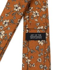 Handmade with 100% imported cotton fabric. Perfect for work, weddings or a night out on the town. This Floral Brown Tie will make you feel like the gentleman you aspire to be or accentuate the gentleman you already are. You’ll look good, feel good and do good things in this tie. Makes the perfect gift for a fellow gentleman or for that man in your life by making them look good and feel good. We guarantee your satisfaction with our free refund policy.* Goes Good With: Brown, Beige, Tan, NavyMater Suit And Tie Accessories For Semi-formal Summer Events, Semi-formal Spring Ties, Dapper Cotton Ties For Formal Occasions, Dapper Cotton Ties For Business, Dapper Cotton Tie For Formal Occasions, Formal Dapper Cotton Ties, Spring Business Cotton Suit And Tie Accessories, Cotton Ties For Workwear In Spring, Elegant Cotton Ties For Spring