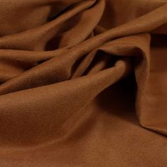 a close up view of a brown fabric