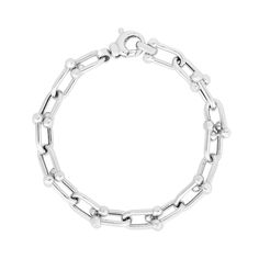 With a sleek and unique design, this silver link chain bracelet instantly elevates your attire. Hollow sterling silver Oval-shaped interlocking links with polished bead accents 9.2mm-wide chain 8.0 inches; lobster claw clasp Sterling Silver Everyday Bracelet With Solid Chain Link, Sterling Silver Bracelet With Solid Links For Everyday Wear, White Gold Oval Link Chain Bracelet For Everyday, Everyday White Gold Oval Link Chain Bracelet, Elegant Silver Paperclip Chain Bracelet, Modern Box Chain Bracelet With Oval Links, Modern Silver Chain Bracelet With Rectangular Links, Modern Silver Paperclip Bracelet With Oval Links, Minimalist Polished Chain Link Bracelet