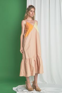 This Color Block Maxi Dress is the perfect blend of style and comfort. Its adjustable spaghetti strap and deep V-neck make it the perfect party dress. The color block pattern adds a touch of elegance and makes it a standout. It features a stunning, maxi length that will make you look and feel fabulous. Plus, it's made with high-quality fabric that ensures comfort and breathability. Perfect for any special occasion, this dress will have you feeling like a million dollars. Maxi length Color block Chic V-neck Color Block Dresses, Summer Orange Color Block Dresses, Spring Color Block V-neck Maxi Dress, Spring V-neck Color Block Maxi Dress, Summer Color Block V-neck Maxi Dress, Summer V-neck Color Block Dress, Orange Color Block V-neck Dress, Orange V-neck Color Block Dress, Chic Color Block Midi Maxi Dress