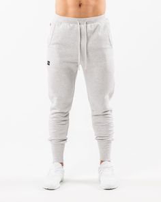 HIGHLIGHTS Relaxed fit w/ tapered leg Medium weight, warm brushed fleece on inside Smooth outer surface Elastic ribbed waistband & high cuffs Elongated flat drawstrings Hidden zipper pocket on right hip Soft touch TPU label on right thigh Raised rubber logo on left thigh 29.5" inseam FIT SUGGESTION. This item runs true to Alphalete’s relaxed. fit.. If you are between sizes, we recommend sizing up. Model is 5’10”/177.8cm, wearing a size M with a 34.5”/87.6cm waist.. MATERIALS AND WASHING DIRECTIO Cuffed Joggers, Workout Fits, Hip Hip, Ombre Effect, Post Workout, Medium Weight, Hidden Zipper, Athleisure, Workout Clothes