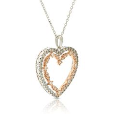 A white gold heart holds a stylized rose gold heart, with diamonds lining each open heart, to form a perfectly romantic pendant with a warm two-tone look. White Diamond Heart Pendant Necklace For Anniversary, White Heart Pendant Diamond Necklace For Anniversary, White Diamond Open Heart Necklace, White Diamond Open Heart Necklace For Anniversary, White Open Heart Diamond Necklace For Anniversary, Rose Gold Heart Pendant Diamond Necklace, White Heart-shaped Diamond Necklace For Anniversary, Formal White Double Heart Necklace, White Double Heart Diamond Necklace