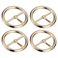 four gold metal buckles with two loops on each side and one loop in the middle