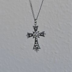 This silver gothic cross necklace boasts a vintage celtic pendant design, making it the perfect minimalist religious jewelry gift idea for your Catholic friend who appreciates grunge-inspired accessories. 𝐃𝐄𝐓𝐀𝐈𝐋𝐒:  ⭐️ Necklace lengths available 14" 16" 18" 20" ⭐️ Cross pendant size is 1 1/2" ⭐️ The silver cross charm is silver plated over alloy. The chain necklace is up on stainless steel, safe for sensitive skin ⭐️ The best statement piece, The Enlightend cross necklace  ⭐️ ALL jewelry i Gothic Cross Pendant Clavicle Chain Necklace, Gothic Clavicle Chain Necklace With Cross Pendant, Gothic Cross Jewelry As Gift, Gothic Cross Jewelry Gift, Gothic Cross Jewelry For Gifts, Gothic Cross Necklace With Clavicle Chain, Gothic Cross Clavicle Chain Jewelry, Gothic Nickel-free Cross Jewelry, Gothic Cross Pendant Jewelry Gift