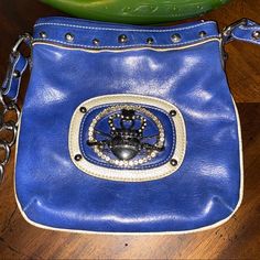 This Adorable Cross Body Is A Great Size For All Your Needs. It Features A Zip Top, Back Zippered Pocket. A Zippered Pocket And 3 Open Pockets Inside. Blue Handheld Bag With Zipper Closure, Denim Blue Cotton Shoulder Bag With Zipper Closure, Blue Bags With Zipper Pocket For On-the-go, Blue On-the-go Bag With Zipper Closure, Kathy Van Zeeland, Blue Crossbody Bag With Anti-theft Pocket, Blue Handbags, Inside Pocket, Leather Shoulder Bag