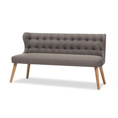 a gray couch with wooden legs on a white background