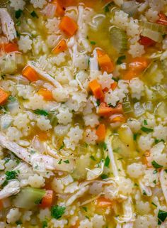 chicken and rice soup in a bowl with carrots