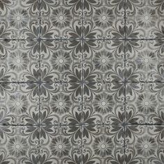 an artistic tile design in grey and white