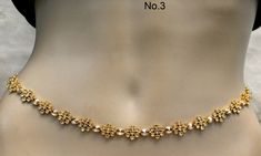 * Beautifully designed gold color belly chain. * can be used with belly dance costumes and saris. * D.no.1- Gold Belly chain high quality Adjustable from 28 to 39 inches Waist. D.no.2- Gold Belly chain high quality Adjustable from 28 to 39 inches Waist. Gold Waist Chain With Beads As Gift, Festive Gold Necklaces With Motifs, Elegant Gold Beaded Waist Chain, Gold Necklaces With Motifs For Diwali, Gold Necklaces With Diwali Motifs, Gold Necklace With Diwali Motifs, Elegant Gold Kundan Necklace With Motifs, Adjustable Gold Kundan Necklace With Latkans, Elegant Gold Waist Chain For Festive Occasions