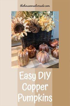 an easy diy copper pumpkin centerpiece with sunflowers and other fall decorations