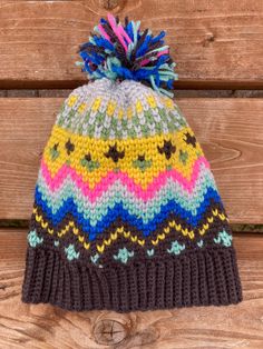 Cute and bright handmade toboggan-style beanie with handmade pom pom on top! Fun colors any kid would love!  Ready to ship. FREE SHIPPING! Pattern by Yarnspirations. Yarn is medium weight acrylic. Fair Isle Beanie, African Hats, Style Beanie, Handmade Hats, Handmade Hat, Skull Cap Beanie, Skull Cap, Fair Isle, Medium Weight