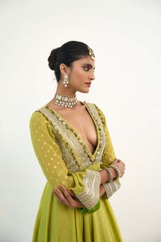 Introducing the asteria anarkali, crafted from a blend of georgette and chanderi silk in a refreshing lime green hue. This ensemble exudes timeless elegance with its flowing silhouette and intricate detailing, promising to make a statement at any event. Elevate your style with the epitome of grace and sophistication. Green Maxi Length Sharara With Pallu, Green Anarkali Silk Choli, Green Silk Dress With Gota Work, Elegant Pista Green Anarkali Set With Gota Work, Green Chanderi Maxi Length Dupatta, Designer Green Georgette Dresses, Green Bollywood Georgette Dress, Green Chanderi Maxi-length Dupatta, Elegant Green Choli With Sheer Dupatta