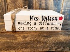 a wooden sign that says, ms wilson making a difference, one story at a time