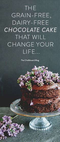 a chocolate cake with purple flowers on top and the quote, the grain - free dairy - free chocolate cake that will change your life